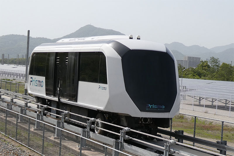 三菱重工、全自動無人運転車両システムの新ブランド 架線不要で自動